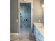 Elegant bathroom with a marble shower and modern vanity at 001 Beatties Ford Rd, Huntersville, NC 28078