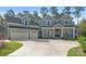 Two-story home with attached three car garage at 001 Beatties Ford Rd, Huntersville, NC 28078