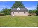 Stone house with a large backyard and wooden deck at 2120 Old Salisbury Concord Rd, Concord, NC 28025