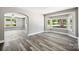 Spacious living room with hardwood floors and large windows at 2120 Old Salisbury Concord Rd, Concord, NC 28025