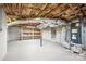 Unfinished basement with shelving and HVAC system at 2120 Old Salisbury Concord Rd, Concord, NC 28025