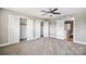 Large bedroom with multiple closets and access to a hallway at 2120 Old Salisbury Concord Rd, Concord, NC 28025