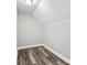 Bright attic bonus room with sloped ceilings and wood flooring at 2120 Old Salisbury Concord Rd, Concord, NC 28025
