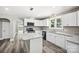 Modern kitchen with white cabinets, granite counters, and island at 2120 Old Salisbury Concord Rd, Concord, NC 28025