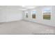 Spacious bedroom with ample natural light and carpeting at 119 Stonewater Dr # 22P, Red Cross, NC 28129