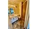 Bathroom with white vanity, tiled shower, and tiled floor at 1323 Queens Rd # 212, Charlotte, NC 28207