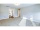 Large bedroom with carpet flooring and access to a bathroom at 1465 Ardmore Dr # 237, Sherrills Ford, NC 28673