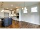 Open concept kitchen with island and stainless steel appliances at 1465 Ardmore Dr # 237, Sherrills Ford, NC 28673