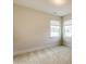 Bright bedroom with carpet flooring and two windows offering natural light at 1465 Ardmore Dr # 237, Sherrills Ford, NC 28673