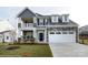 Two-story home with gray siding and stone accents at 1465 Ardmore Dr # 237, Sherrills Ford, NC 28673