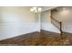 Dining room with hardwood floors, chandelier, and staircase at 1465 Ardmore Dr # 237, Sherrills Ford, NC 28673