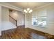 Spacious dining room with hardwood floors, wainscoting, and large window at 1465 Ardmore Dr # 237, Sherrills Ford, NC 28673
