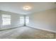 Spacious bedroom with neutral walls, carpet, and multiple windows at 1465 Ardmore Dr # 237, Sherrills Ford, NC 28673