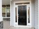 Modern black front door with sidelights and a gray exterior at 1465 Ardmore Dr # 237, Sherrills Ford, NC 28673