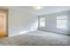 Bright bedroom with two windows and carpet flooring at 1465 Ardmore Dr # 237, Sherrills Ford, NC 28673