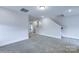 Spacious loft area with grey carpeting and staircase at 1465 Ardmore Dr # 237, Sherrills Ford, NC 28673