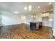 Open floor plan with kitchen island and dark wood cabinets at 1465 Ardmore Dr # 237, Sherrills Ford, NC 28673