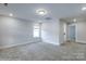 Large bedroom with carpet and access to another room at 1465 Ardmore Dr # 237, Sherrills Ford, NC 28673