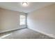 Spacious bedroom with carpet flooring and large window at 1465 Ardmore Dr # 237, Sherrills Ford, NC 28673