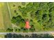 Aerial view of a house with red roof surrounded by lush greenery at 2491 Highway 274 Hwy, Cherryville, NC 28021