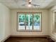 Bright basement room with large window and wood-look floors at 416 Plantation Way, Mount Gilead, NC 27306