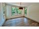 Spacious dining area with hardwood floors and a modern light fixture at 416 Plantation Way, Mount Gilead, NC 27306