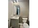 Modern bathroom with a vanity, toilet and mirror at 416 Plantation Way, Mount Gilead, NC 27306