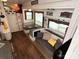 Living area with sofa, dining table, and loft bed at 332 Mount View Ln, New London, NC 28127