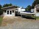 Property with RV and boat parking in front at 332 Mount View Ln, New London, NC 28127