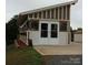 Exterior view of property with double doors at 332 Mount View Ln, New London, NC 28127