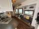 Cozy living room with sofa, table, and built-in seating at 332 Mount View Ln, New London, NC 28127