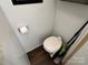 Small toilet room with a toilet and storage at 332 Mount View Ln, New London, NC 28127