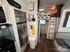 Kitchen area with refrigerator and storage at 332 Mount View Ln, New London, NC 28127