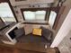 Comfortable gray sofa with decorative pillows at 332 Mount View Ln, New London, NC 28127
