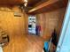 Interior storage room with shelving and laminate flooring at 332 Mount View Ln, New London, NC 28127