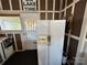 Full-size refrigerator in the outdoor kitchen at 332 Mount View Ln, New London, NC 28127