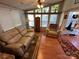Spacious living room with a neutral color scheme and two recliners at 108 Meadowview Cir, New London, NC 28127