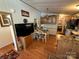 Kitchen with dining area and wood floors at 108 Meadowview Cir, New London, NC 28127
