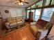 Relaxing living room with ample natural light and seating at 108 Meadowview Cir, New London, NC 28127