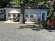 Quaint one-story home with outdoor patio furniture at 108 Meadowview Cir, New London, NC 28127