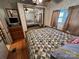 Spacious bedroom with mirrored closet doors and a comfortable bed at 108 Meadowview Cir, New London, NC 28127