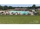Community swimming pool with plenty of seating at 108 Meadowview Cir, New London, NC 28127
