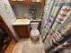Clean bathroom with a shower/tub combo, toilet, and vanity at 108 Meadowview Cir, New London, NC 28127