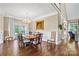 Spacious dining room with hardwood floors and large windows at 5610 Golden Pond Dr, Indian Trail, NC 28079
