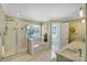 Elegant bathroom with soaking tub, shower, and double vanity at 5610 Golden Pond Dr, Indian Trail, NC 28079