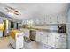 Modern kitchen featuring stainless steel appliances and an island at 5610 Golden Pond Dr, Indian Trail, NC 28079