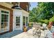 Brick patio with seating area and beautiful landscaping at 5610 Golden Pond Dr, Indian Trail, NC 28079