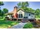 Ranch house with brick chimney and large deck at 5610 Golden Pond Dr, Indian Trail, NC 28079