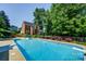 Sparkling pool with a large backyard and house view at 5610 Golden Pond Dr, Indian Trail, NC 28079