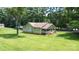 Charming ranch home with a large front yard and mature trees at 5610 Golden Pond Dr, Indian Trail, NC 28079